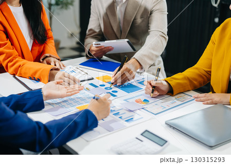 Business team meeting. professional investor working new start up project. Finance task. with smart phone and laptop Business team meeting. professional investor working new start up project. Finance task. with smart phone and laptop 130315293