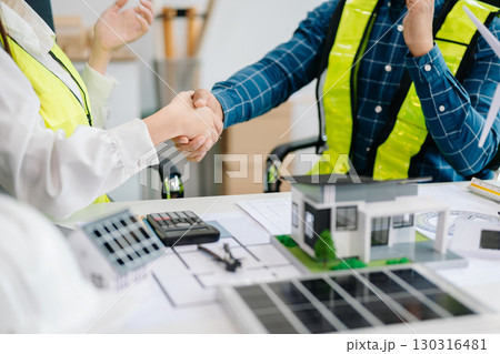 usiness people having consultation about wind energy at company office. on architectural project site and making model house usiness people having consultation about wind energy at company office. on architectural project site and making model house 130316481