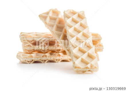 Sweet crispy wafers isolated on white background. Sweet crispy wafers isolated on white background. 130319669