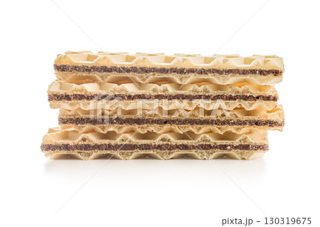 Sweet crispy wafers isolated on white background. Sweet crispy wafers isolated on white background. 130319675