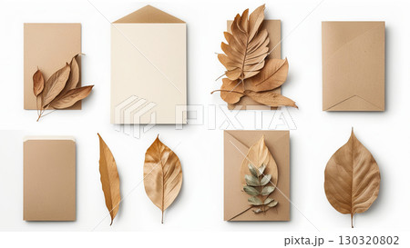 A flat lay composition featuring various shades of brown and beige stationery envelopes and leaves atop a clean, white background. 130320802