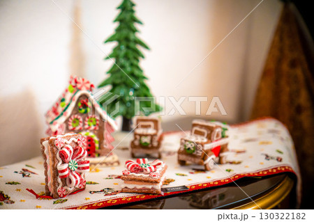 Christmas table composition. Beautiful decoration. Christmas trees, candles, stars, lights and elegant accessories. Merry Christmas and Happy Holidays, Template. Christmas table composition. Beautiful decoration. Christmas trees, candles, stars, lights and elegant accessories. Merry Christmas and Happy Holidays, Template. 130322182