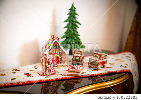 Christmas table composition. Beautiful decoration. Christmas trees, candles, stars, lights and elegant accessories. Merry Christmas and Happy Holidays, Template. Christmas table composition. Beautiful decoration. Christmas trees, candles, stars, lights and elegant accessories. Merry Christmas and Happy Holidays, Template. 130322183