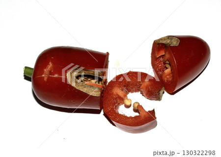 Home grown chilli pepper vegetable wonky and damaged eaten by slugs and pests ruined 130322298