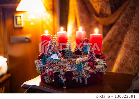 Christmas table composition. Beautiful decoration. Christmas trees, candles, stars, lights and elegant accessories. Merry Christmas and Happy Holidays, Template. 130322391