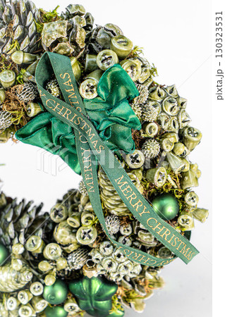 Christmas table composition. Beautiful decoration. Christmas trees, candles, stars, lights and elegant accessories. Merry Christmas and Happy Holidays, Template. 130323531