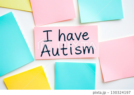 Flat lay of colorful notes with text I have Autism on pink note Flat lay of colorful notes with text I have Autism on pink note 130324197