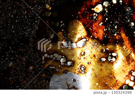 Close up of bubbling oil and fat grilled abstract food backgrouond 130324399