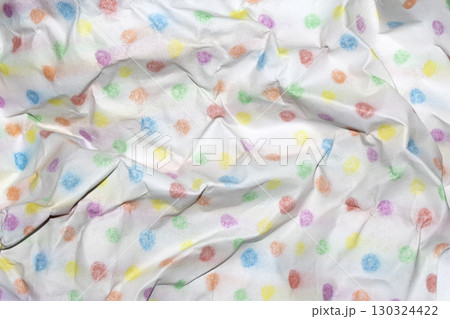 Crumpled paper with children's pencil crayon spotty polka dots background Crumpled paper with children's pencil crayon spotty polka dots background 130324422