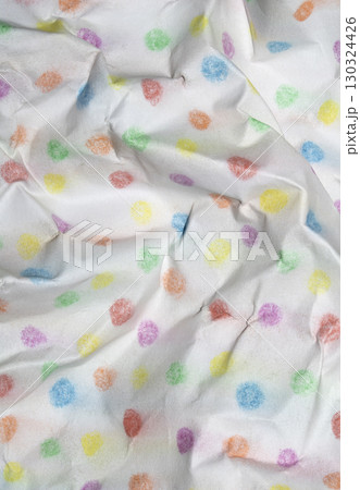 Crumpled paper with children's pencil crayon spotty polka dots background 130324426