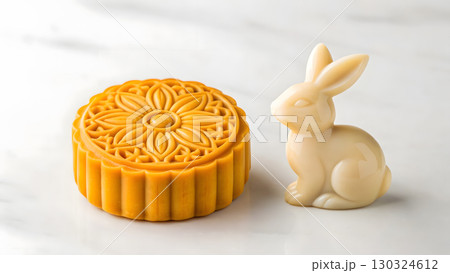 Colorful mooncake and rabbit figurine for traditional festival celebration in fall season Colorful mooncake and rabbit figurine for traditional festival celebration in fall season 130324612