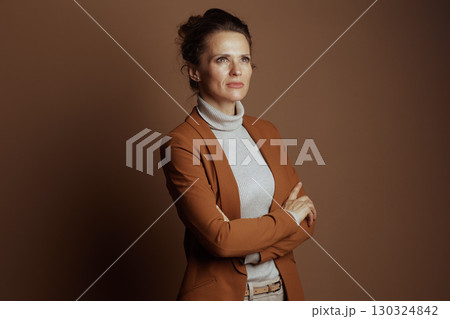 Thoughtful Businesswoman Pondering Strategy 130324842