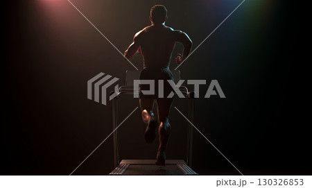 Athletic male running on treadmill in dark gym with dramatic lighting 130326853