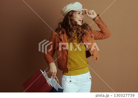 Happy Woman Posing with Autumn Shopping Happy Woman Posing with Autumn Shopping 130327739