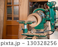 Carpentry, vintage wood lathe turning with copy space. 130328256
