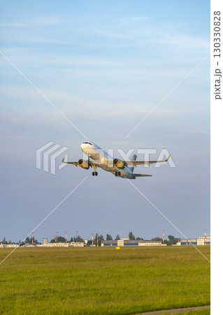 Passenger airplane taking off from Hostivice Airport in Prague, Czechia Passenger airplane taking off from Hostivice Airport in Prague, Czechia 130330828