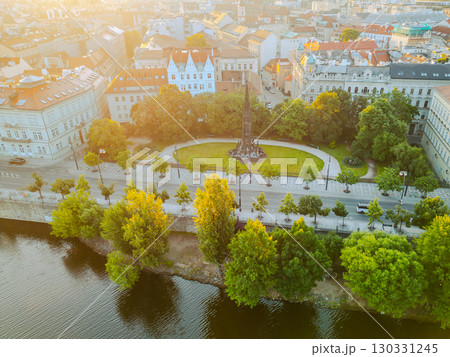 Aerial view of the Park of the National Awakening in Prague, featuring Kranner's Fountain surrounded by greenery along the Vltava River in the heart of the city. Aerial view of the Park of the National Awakening in Prague, featuring Kranner's Fountain surrounded by greenery along the Vltava River in the heart of the city. 130331245