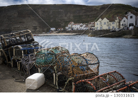 Looking across the harbour at Staithes in Yorkshire 130331615