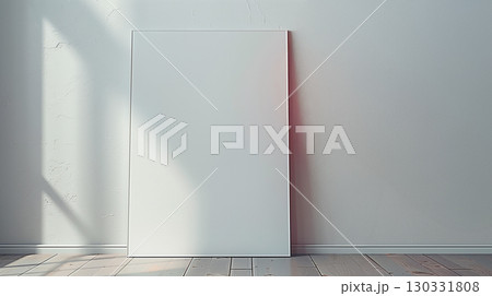 Minimalist blank white frame mock up leaning on gray wall with sunlight in modern interior room 130331808