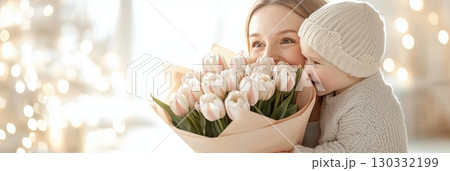 Mother Receiving Flowers and a Hug Mother Receiving Flowers and a Hug 130332199