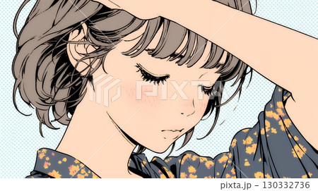 髪をかきあげている（なでている）若い女性
