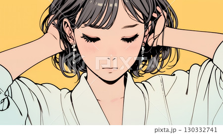 髪をかきあげている（なでている）若い女性
