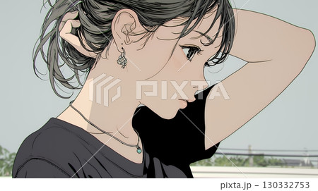 髪をかきあげている（なでている）若い女性