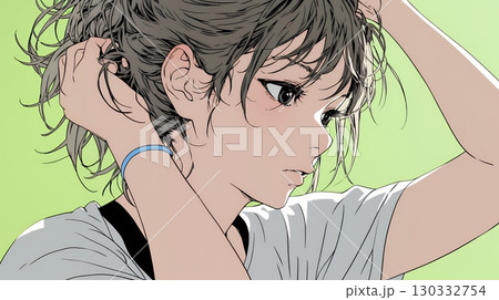 髪をかきあげている（なでている）若い女性