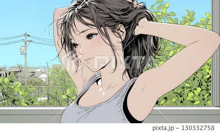 髪をかきあげている（なでている）若い女性