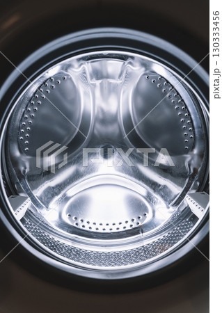 Washing Machine Drum Chrome Interior Close-up Washing Machine Drum Chrome Interior Close-up 130333456