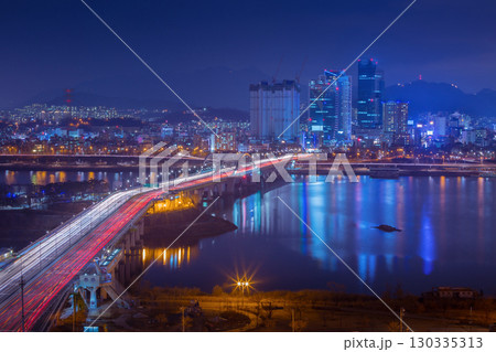 Seoul City and the Railway Bridge, a beautiful night along the Han River in South Korea, South Korea. 130335313
