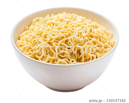 A bowl holds a pile of golden instant noodles, showcasing their curly, wavy texture against a clean white background. 130337192