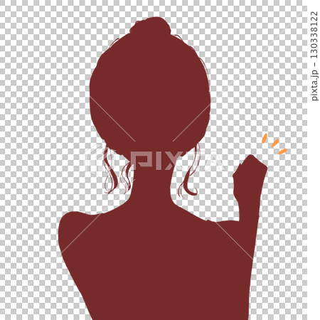 微笑的女人用一隻手握拳，髮髻，輪廓 130338122