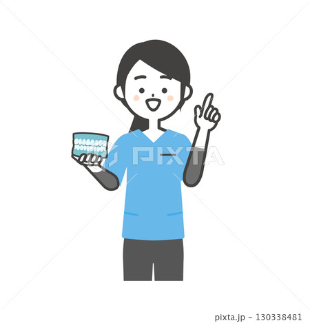 歯の模型を持って指を立てるスクラブ姿の女性イラスト 130338481