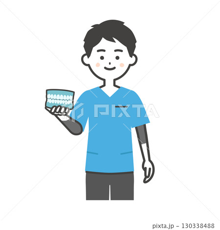 歯の模型を持つスクラブ姿の男性イラスト 130338488