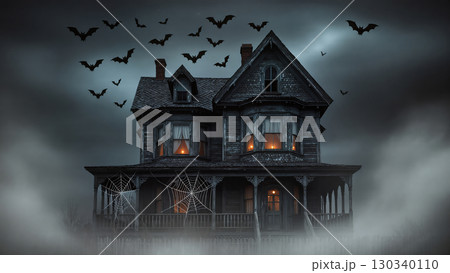 Spooky haunted house with glowing windows, spider webs, flying bats and thick fog creates eerie Halloween night atmosphere. Spooky haunted house with glowing windows, spider webs, flying bats and thick fog creates eerie Halloween night atmosphere. 130340110