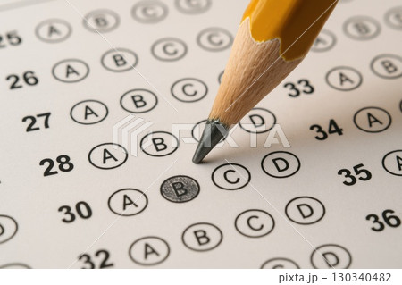 Standardized Test Pencil Marking Answers Classroom Closeup Image Bright Environment Focused View Academic Preparation 130340482
