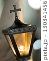 Candle lighting in a lantern during de Holy Week in Spain. 130341456