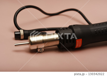 Black hair dryer soldering iron. Soldering iron for mounting radio elements. Black hair dryer soldering iron. Soldering iron for mounting radio elements. 130342022