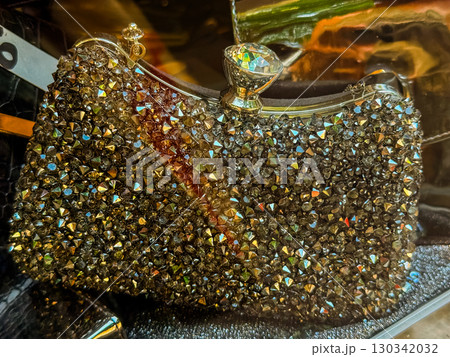 Sparkling clutch handbag with crystal rhinestones. Fashion, luxury and evening elegance with glamour accessories. Sparkling clutch handbag with crystal rhinestones. Fashion, luxury and evening elegance with glamour accessories. 130342032