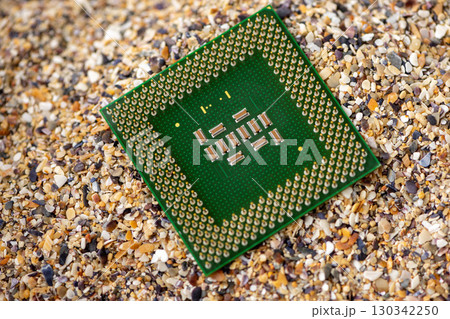 Close-up of a processor with sand in the background 130342250