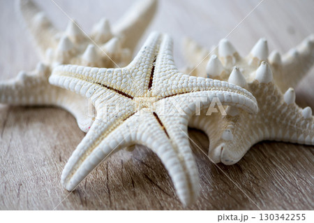Starfish on a wooden table 130342255