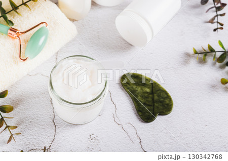 Moisturizing cream with beef tallow in a jar on the table 130342768