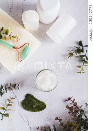Moisturizing cream with beef tallow in a jar on the table top and vertical view Moisturizing cream with beef tallow in a jar on the table top and vertical view 130342773