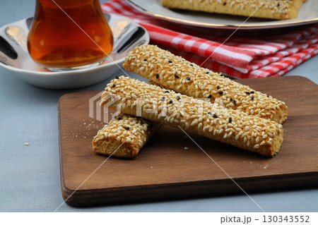 A plate of cookies is sitting on the table. A plate of cookies is sitting on the table. 130343552
