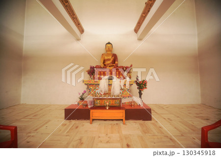 Golden Buddha sitting inside at Spituk Monastery, also known as Spituk Gompa or Petup Gompa, is a Buddhist monastery located in the Leh district of Ladakh, India. 130345918