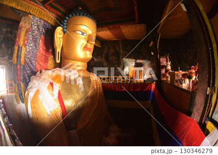 Face of Sakyamuni Buddha, a large golden Buddha statue in the Shey Palace. The Shey Monastery or Gompa and the Shey Palace complex are structures located on a hillock to the south of Leh in Ladakh. 130346279