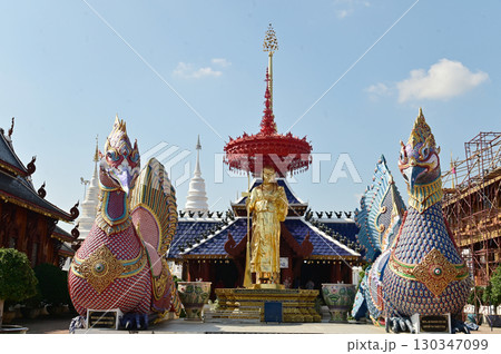 The statues of animals in Thai literature and monks are Thai art that decorate the front of the pagoda at Wat Den Sali Si Mueang Kaen temple. Located at Chiang Mai Province in Thailand. 130347099