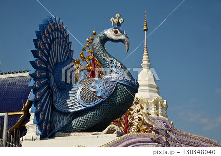 The statues of peacock in Thai literature are Thai art that decorate the front of the pagoda at Wat Den Sali Si Mueang Kaen temple. Located at Chiang Mai Province in Thailand. The statues of peacock in Thai literature are Thai art that decorate the front of the pagoda at Wat Den Sali Si Mueang Kaen temple. Located at Chiang Mai Province in Thailand. 130348040