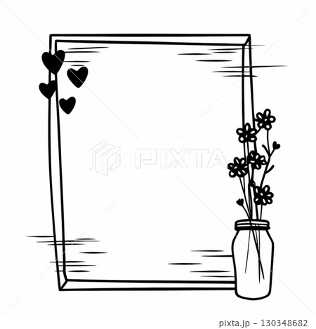 simple flower bouquet in a glass jar on the left corner 130348682